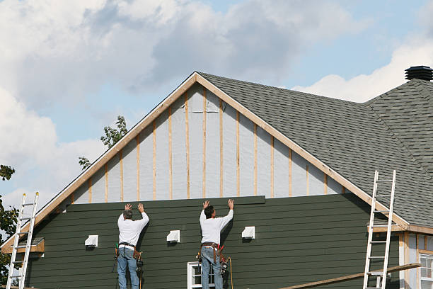 Professional Emergency Siding Repair technician working in Coats, NC